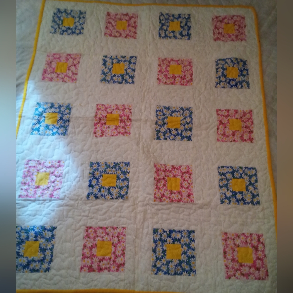 Handmade Patchwork Quilt with Floral Patterns. Great for baby or toddlers